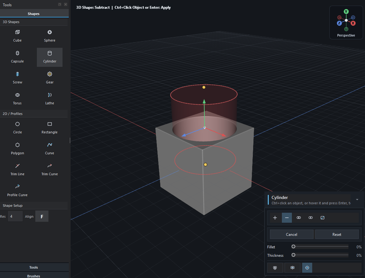 A cylinder cutter overlapping a cube, with Subtract selected in the Actions Panel.